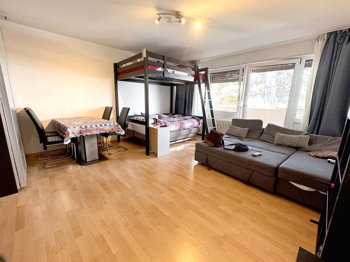 Apartment kaufen in München — Wohnzimmer 1