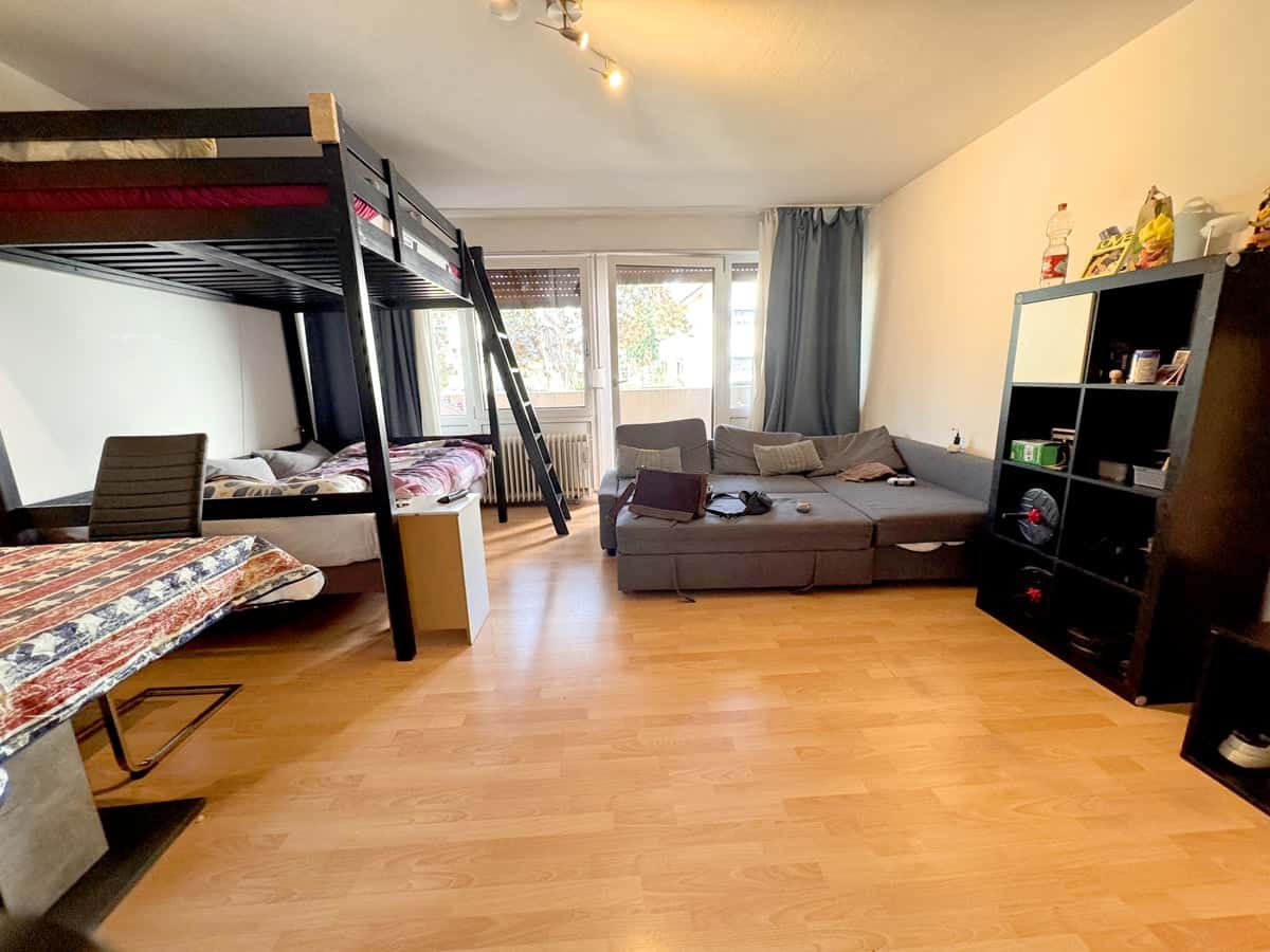 Apartment kaufen in München — Wohnzimmer 2