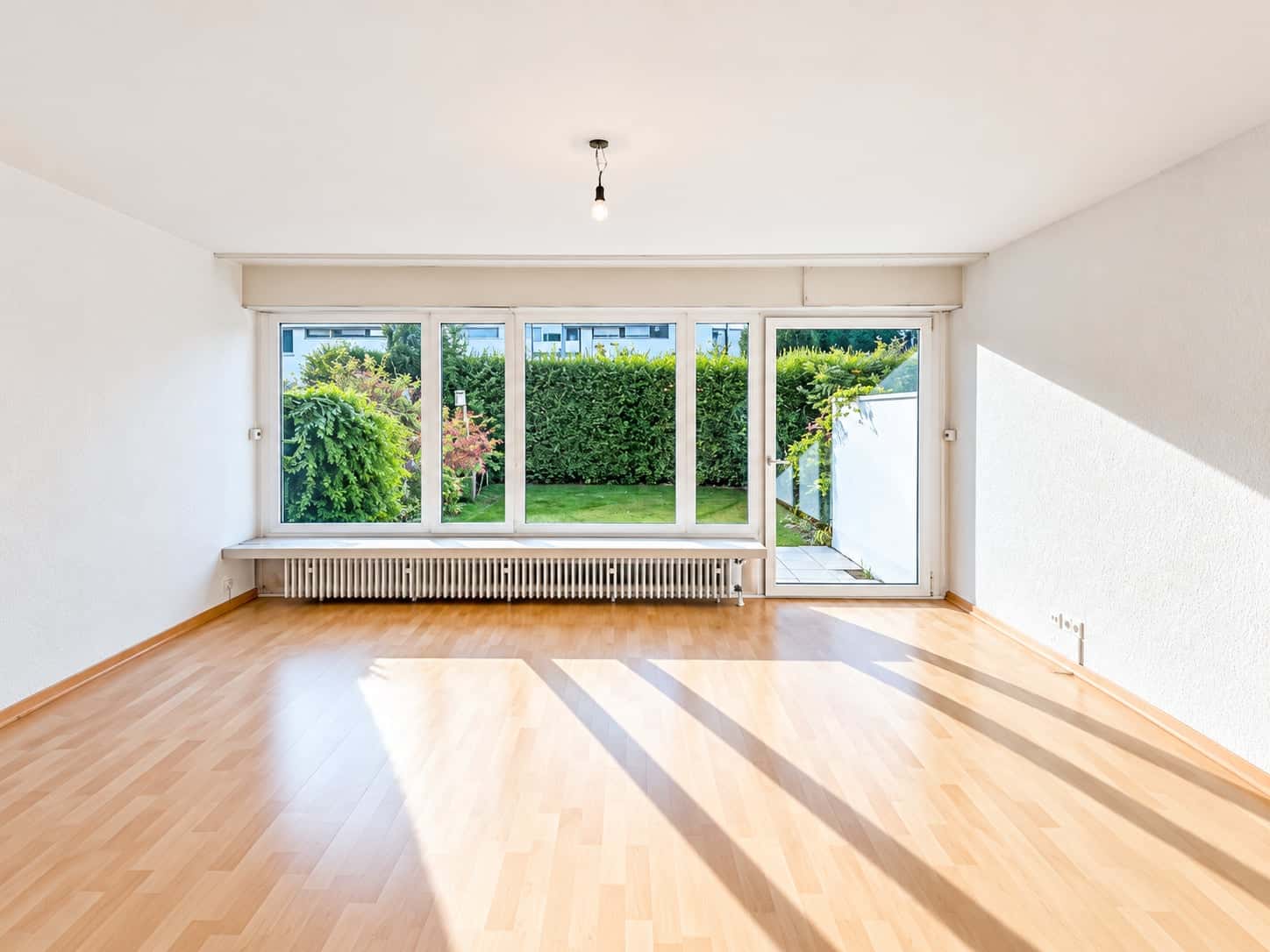 Reihenhaus kaufen in Weßling — Wohnzimmer