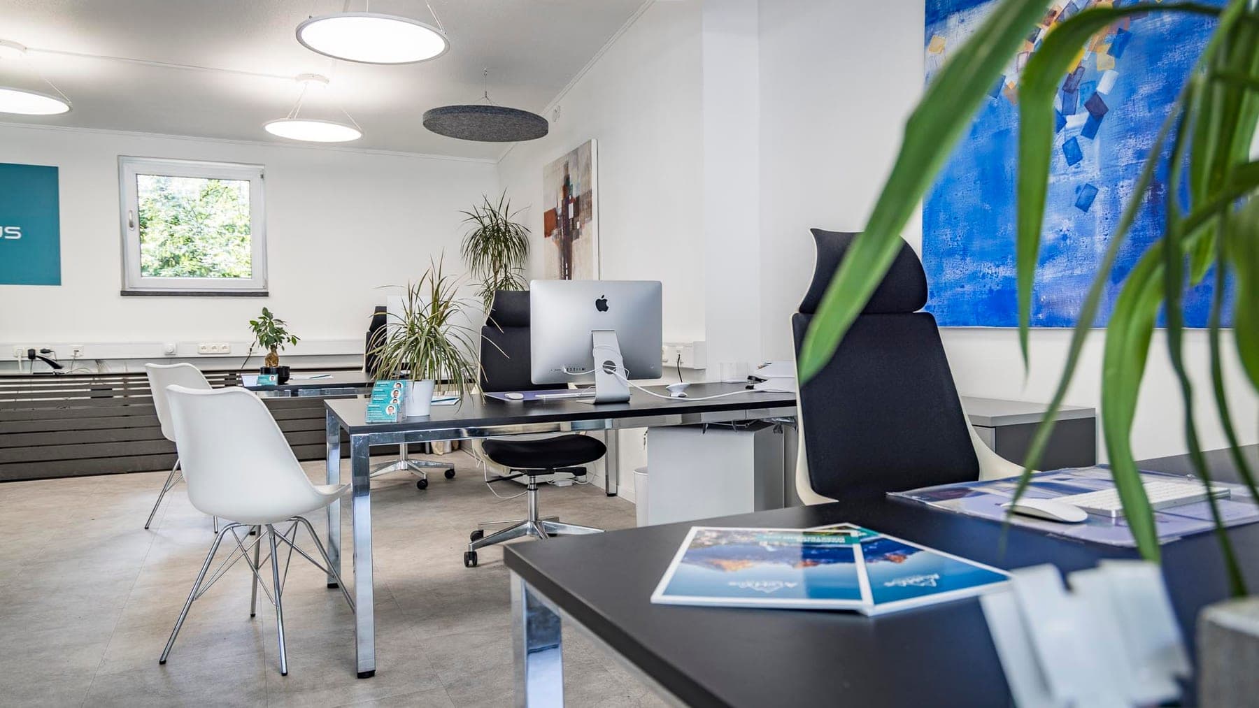 Schreibtisch im Büro Bad Reichenhall mit Unterlagen zur Werteinschätzung