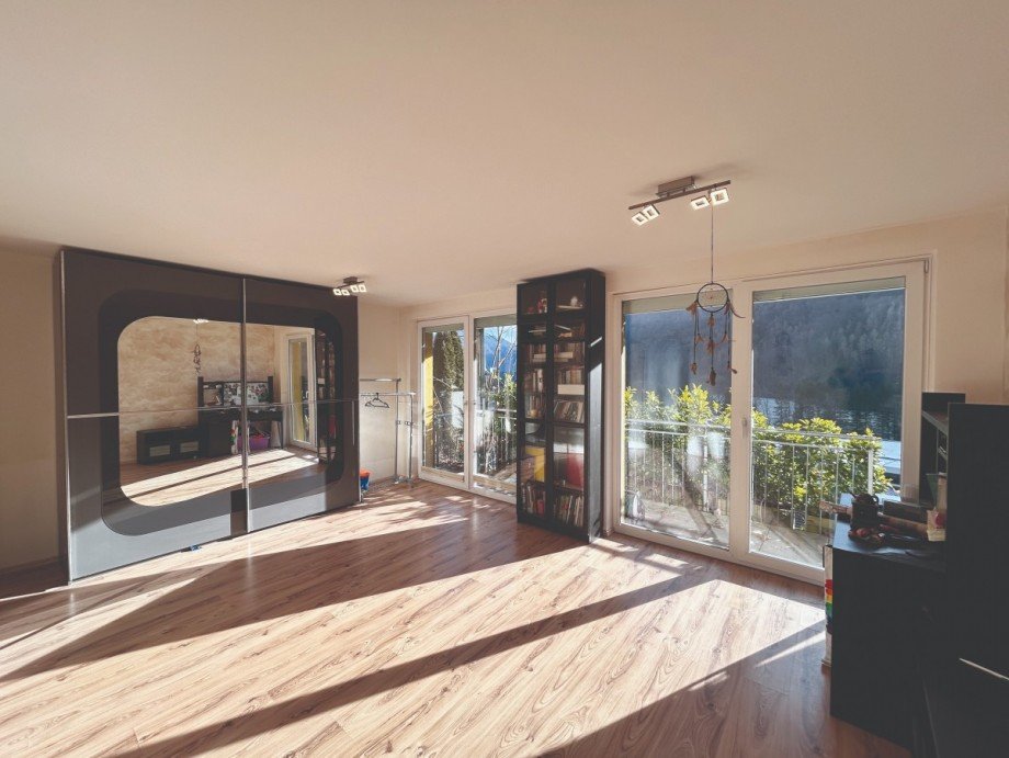 Schlafzimmer im UG mit Ausgang zur Terrasse Einfamilienhaus Golling an der Salzach